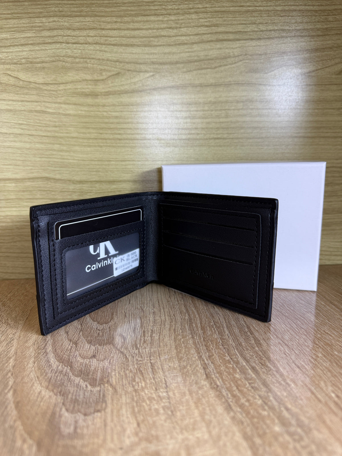 PORTE MONNAIE CK MARRON HOMMES